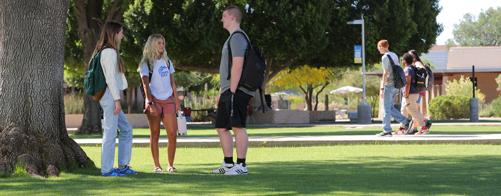 Students talking to each other in the center of the Southern and Dobson campus