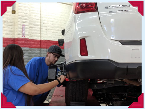 Students working on SUV