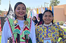 Two Indigenous people in traditional clothing